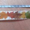 Nastro "foglie d'autunno". Altezza: 2,5 cm.